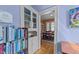 Hallway with built in shelves leading into dining room at 417 Elm St, Raleigh, NC 27604