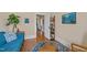 View from living room leading to hallway with hardwood floors and natural lighting at 417 Elm St, Raleigh, NC 27604