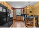 Kitchen with ample counter space, modern appliances, and plenty of storage at 417 Elm St, Raleigh, NC 27604