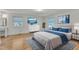 Bright bedroom with hardwood floors, serene decor, and plenty of natural light at 503 Marshall Way, Durham, NC 27705
