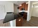 Stylish kitchen with granite countertops and stainless steel appliances at 126 Parker Ln, Mebane, NC 27302