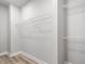 Walk-in closet features white walls and wire shelving at 155 Shelby Meadow Ln, Angier, NC 27501