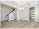 Large open concept dining room area with access to the staircase at 155 Shelby Meadow Ln, Angier, NC 27501