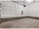 Unfinished garage with concrete floors and cinder block perimeter at 155 Shelby Meadow Ln, Angier, NC 27501