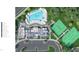 Aerial view of community amenities including resort pool, pickleball courts, patio and club house at 2021 Abbeyhill Dr # 66, Raleigh, NC 27610