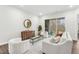 Elegant living room featuring hardwood floors, stylish furniture, and sliding doors to outdoor patio at 2021 Abbeyhill Dr # 66, Raleigh, NC 27610