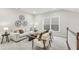 Cozy living room features stylish decor, comfortable seating, and a window for natural light at 2021 Abbeyhill Dr # 66, Raleigh, NC 27610