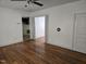 Inviting living room boasts hardwood floors and an open doorway to another living space at 2219 Fitzgerald Ave, Durham, NC 27707