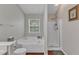 Bright bathroom features a soaking tub next to a glass shower, perfect for relaxation at 3236 Forest Mill Cir, Raleigh, NC 27616