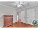Inviting bedroom with hardwood floors, natural light, and closet space, offering a comfortable and practical design at 3236 Forest Mill Cir, Raleigh, NC 27616