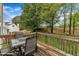 Outdoor deck with seating, perfect for enjoying backyard views and outdoor dining at 3236 Forest Mill Cir, Raleigh, NC 27616