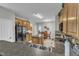 Bright kitchen features stainless steel appliances, lots of wooden cabinets and a center island at 3236 Forest Mill Cir, Raleigh, NC 27616