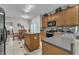 Traditional kitchen with wood cabinets, granite counters, and stainless steel appliances at 3236 Forest Mill Cir, Raleigh, NC 27616