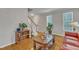 Comfortable living room with hardwood floors and view of the staircase and front entry at 3236 Forest Mill Cir, Raleigh, NC 27616