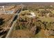 Aerial view of property near road and rail line at 7039 Old 421 Rd, Liberty, NC 27298