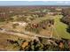 Aerial view of property location near road and rail line at 7039 Old 421 Rd, Liberty, NC 27298