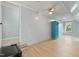 Large bonus room features ample space, wood-look floors, and a unique design for versatile use at 7039 Old 421 Rd, Liberty, NC 27298