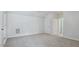 Spacious bedroom with neutral walls and plush carpet flooring, offering a blank canvas at 7529 Percussion Dr, Apex, NC 27539