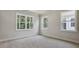 Bedroom with view of mature trees and plenty of light at 7529 Percussion Dr, Apex, NC 27539