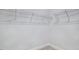 Image shows a closet with wire shelving in a room with neutral walls and carpeted floors at 7529 Percussion Dr, Apex, NC 27539
