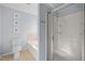 Bathroom with shower and tub with tiled walls and blue paint at 1120 Renewal Place # 108, Raleigh, NC 27603