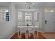 Bright dining room with a bay window and hardwood floors at 1120 Renewal Place # 108, Raleigh, NC 27603