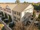 Aerial view of townhomes showcasing classic architecture, landscaping, and convenient parking at 1120 Renewal Place # 108, Raleigh, NC 27603
