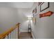 Hallway decorated with sports memorabilia and a modern lamp, illuminated by natural light at 1120 Renewal Place # 108, Raleigh, NC 27603