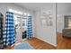 Living space and patio with sliding glass doors allowing for an abundance of natural light at 1120 Renewal Place # 108, Raleigh, NC 27603