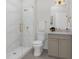 Sleek bathroom featuring a glass-enclosed shower, modern vanity, and elegant gold fixtures at 1204 Holding Village Way, Wake Forest, NC 27587