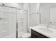 Modern bathroom with glass-enclosed shower, vanity with a light countertop, and contemporary fixtures at 1204 Holding Village Way, Wake Forest, NC 27587
