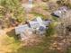 Aerial view of house and surrounding property at 135 Weatherbend, Pittsboro, NC 27312