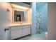 Clean bathroom with shower/tub combo and white vanity at 135 Weatherbend, Pittsboro, NC 27312