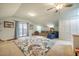 Bonus room with private balcony access and comfy seating at 135 Weatherbend, Pittsboro, NC 27312