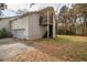 House exterior with attached garage and balcony at 135 Weatherbend, Pittsboro, NC 27312