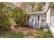 Brick pathway leads to home's exterior entrance at 135 Weatherbend, Pittsboro, NC 27312
