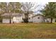Back of house with detached garage and large yard at 135 Weatherbend, Pittsboro, NC 27312