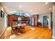 Spacious kitchen with ample cabinetry, an island, and hardwood floors at 135 Weatherbend, Pittsboro, NC 27312