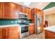 Kitchen with stainless steel appliances and ample counter space at 135 Weatherbend, Pittsboro, NC 27312