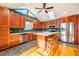Modern kitchen with stainless steel appliances and an island at 135 Weatherbend, Pittsboro, NC 27312