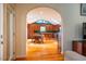 Eat-in kitchen with wooden cabinets, an island and hardwood floors at 135 Weatherbend, Pittsboro, NC 27312