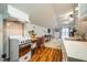 Small kitchenette with stovetop and sink at 135 Weatherbend, Pittsboro, NC 27312