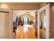 Sunlit living room with hardwood floors and access to deck at 135 Weatherbend, Pittsboro, NC 27312