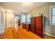 Home office with hardwood floors, desk, and file cabinets at 135 Weatherbend, Pittsboro, NC 27312