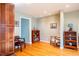 Cozy sitting area with hardwood floors and built-in shelving at 135 Weatherbend, Pittsboro, NC 27312