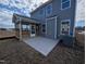 Backyard view of a patio and screened in porch at 150 Steppe Way, Garner, NC 27529