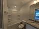 Well-lit bathroom features a shower-tub combo, granite countertop vanity, and modern fixtures at 150 Steppe Way, Garner, NC 27529