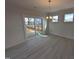 Dining area featuring sliding door access to the outdoor deck at 150 Steppe Way, Garner, NC 27529