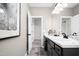 Bathroom featuring a large mirror, vanity, and tiled flooring at 174 Vega Loop, Sanford, NC 27330