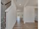 Inviting entryway featuring wood-look flooring, stairway and views of the backyard at 199 Shelby Meadow Ln, Angier, NC 27501